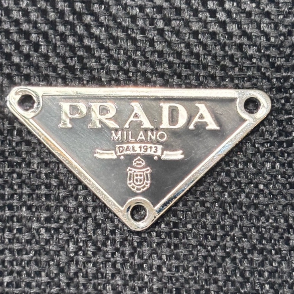 Prada Silver Triangle Emblem